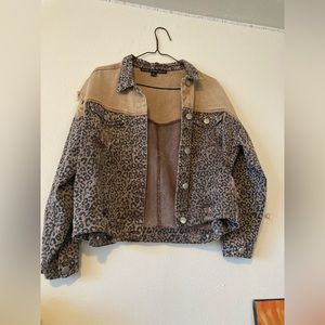Tan and brown cheetah jean jacket with styled rips